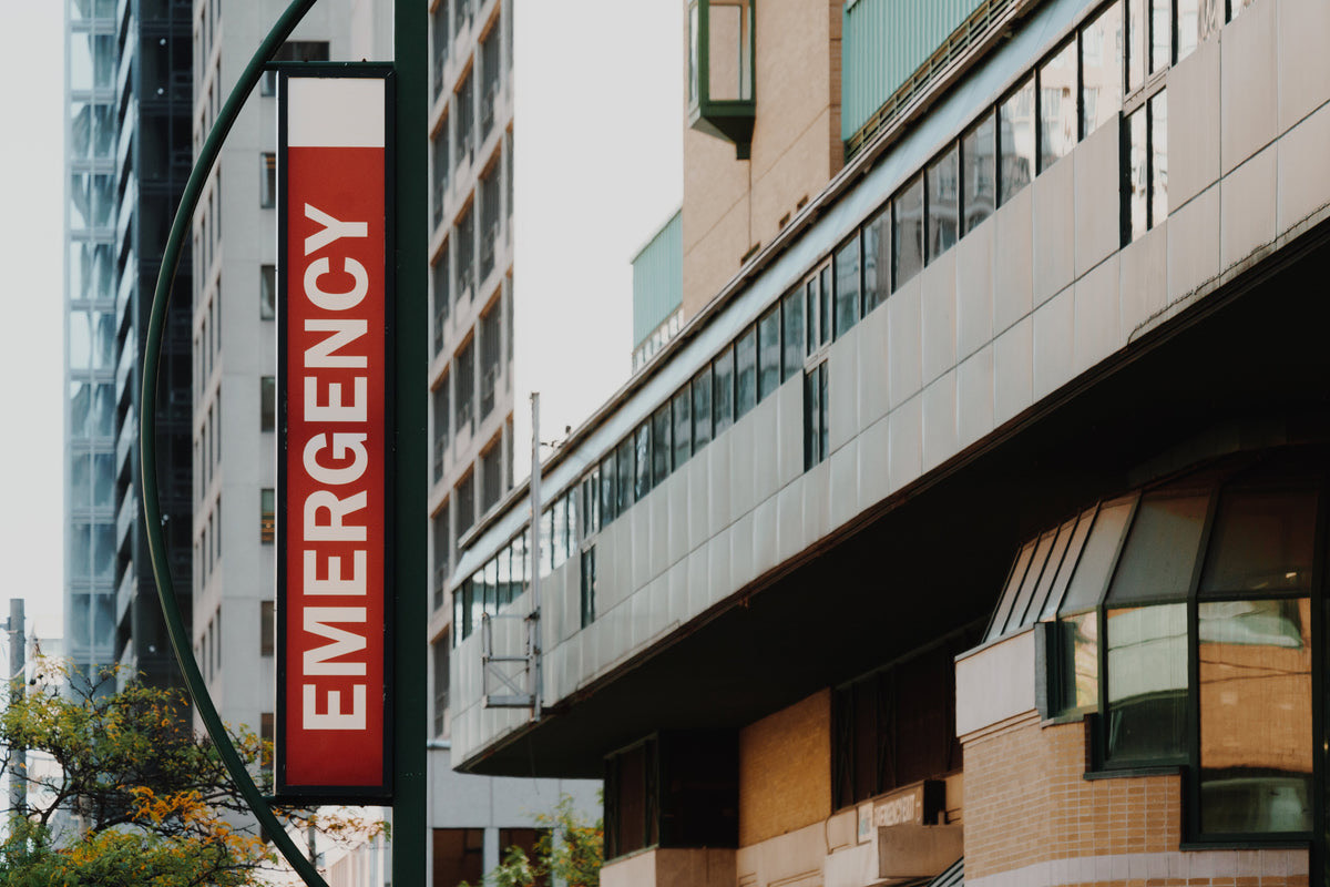 A dentist preparing to treat an emergency patient