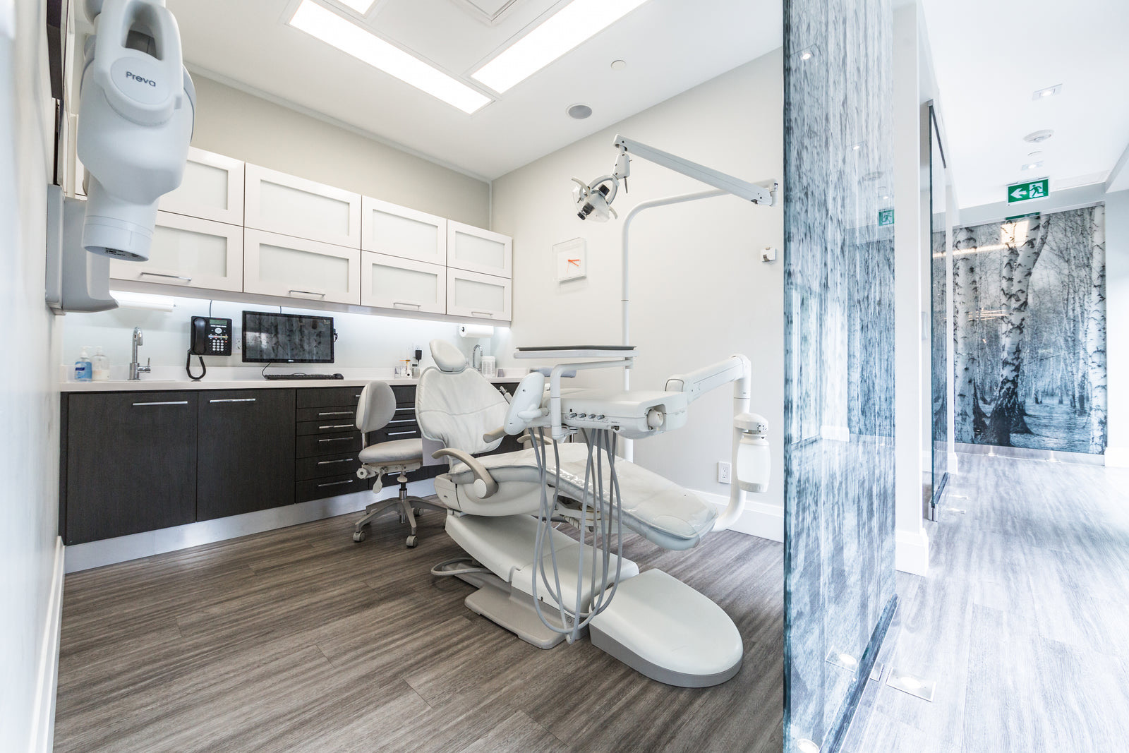 Patients seated in the waiting area of a US dental office