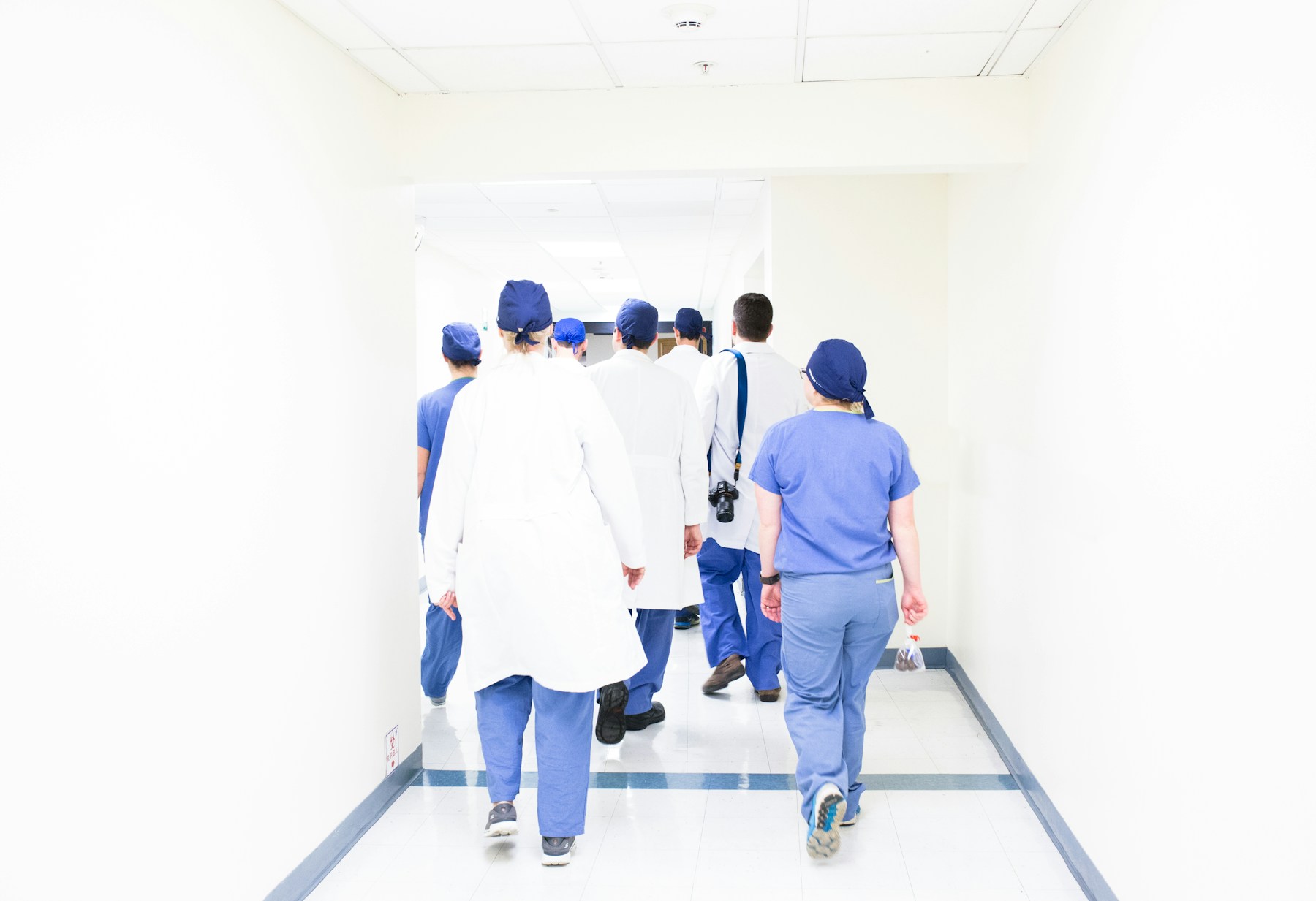 Hospital operations team coordinating department appointments and live patient queues