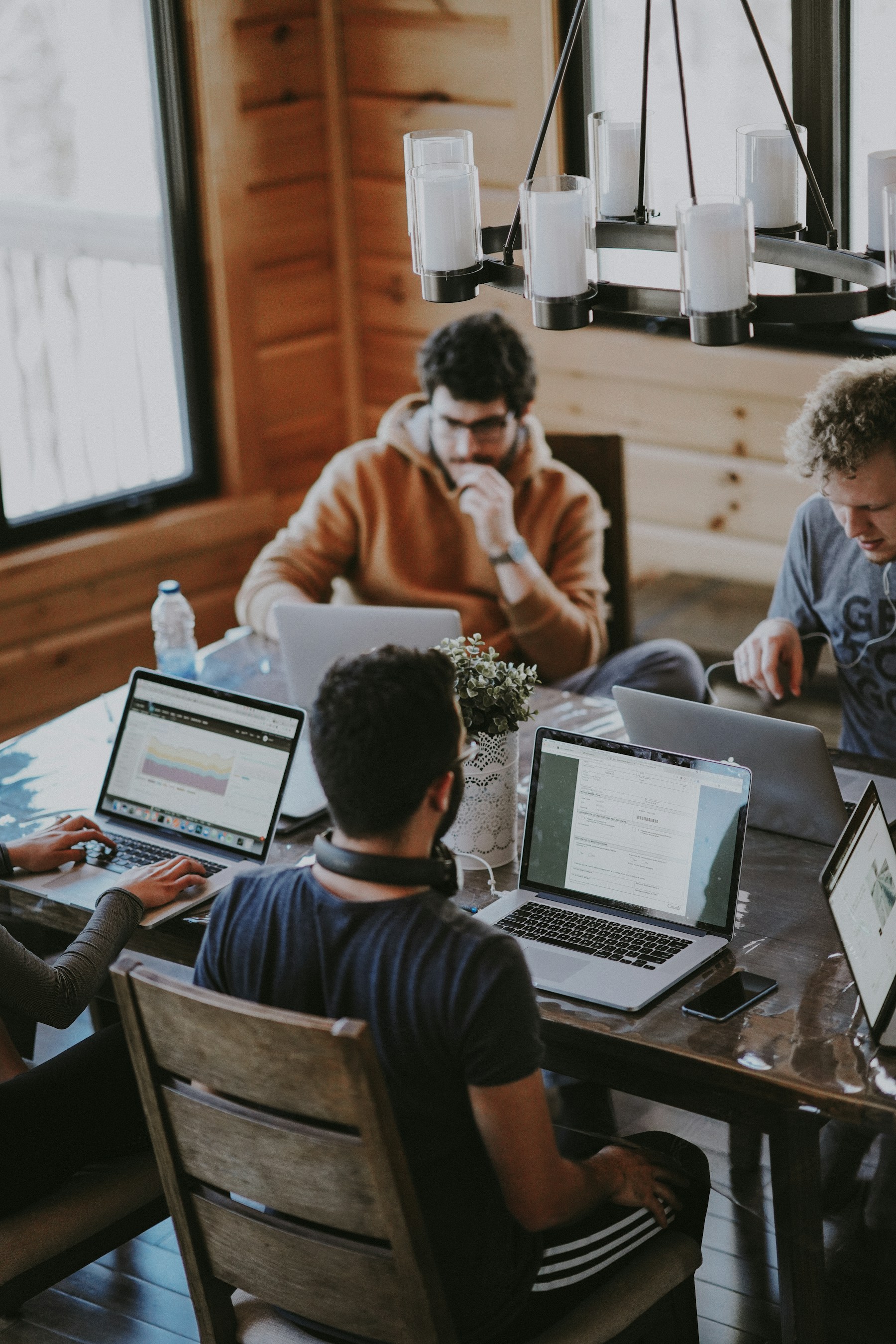 Service business team coordinating customer bookings with a mobile app