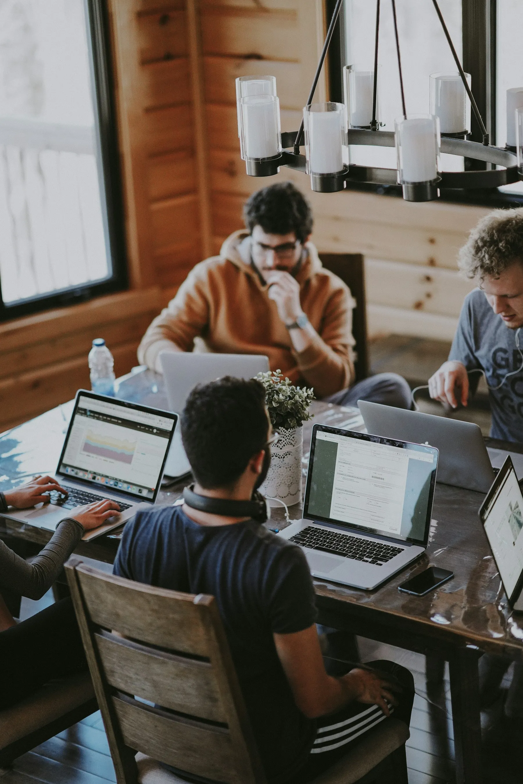 Service business team coordinating customer bookings with a mobile app